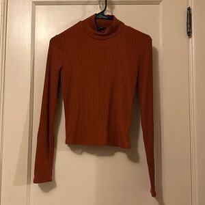 Orange turtle neck